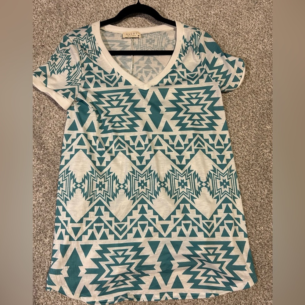 Western T-shirt with turquoise and white pattern size small.